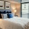 Bedroom with natural lighting and high ceilings