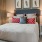 Bedroom with natural lighting and high ceilings