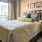 Bedroom with natural lighting and high ceilings